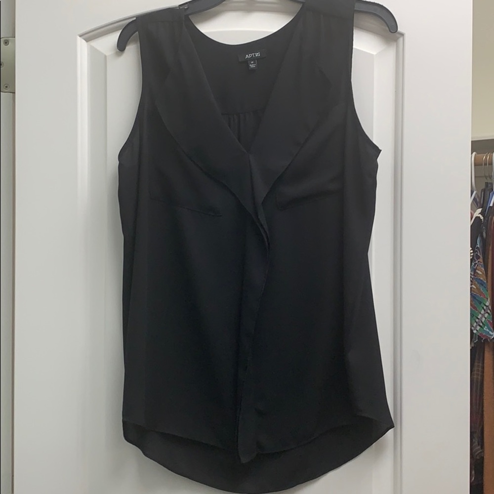 Sleeveless black blouse